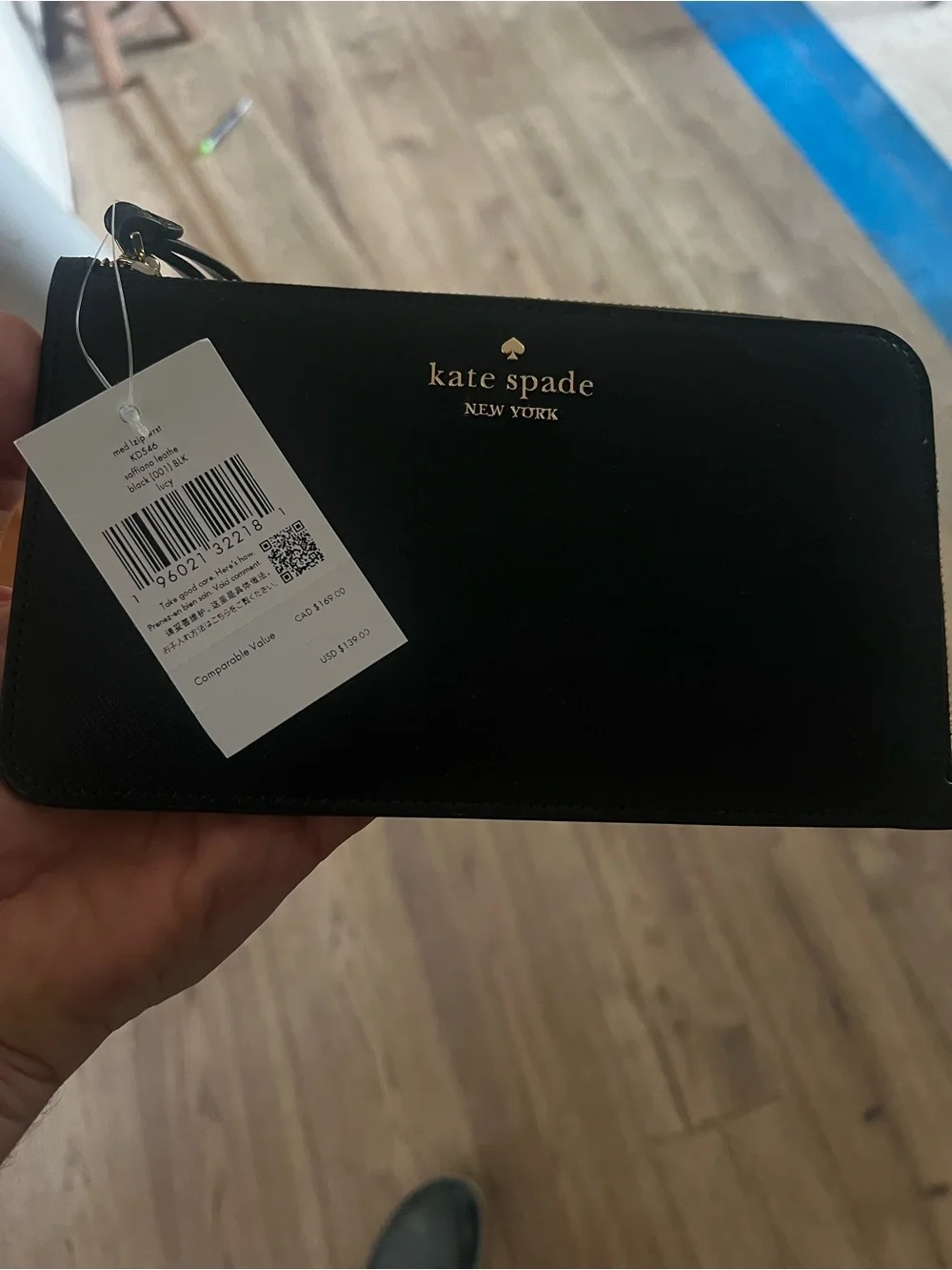 kate spade black zip-around wallet with gold logo